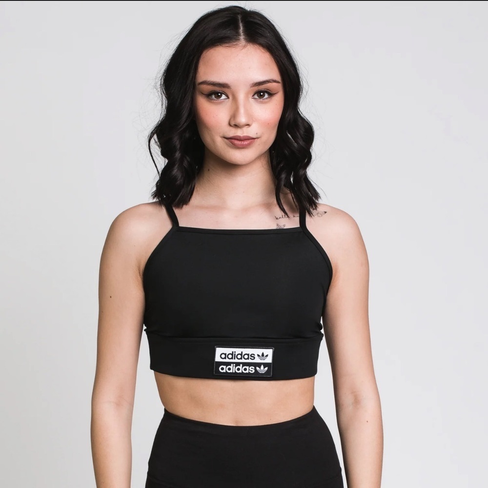 Brand new Women’s Adidas Top-Size Large
